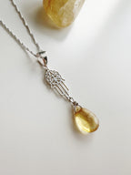 Collar “Luz de prosperidad” Mano de Fátima con Cuarzo Citrino. PLATA 925