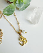 Collar OM con Cuarzo Cristal.Incluye significado y Packing para regalo