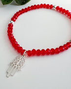 Pulsera “Protección y Amor” – Cristales Rojos con Mano de Fátima
