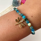 Pulsera Libélula, en piedras verdosas . Incluye packing para regalo