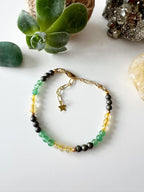 Pulsera “Triada de Abundancia”. Incluye significado de sus piedras y Packing para regalo