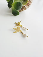 Aros colibrí en perlitas naturales. Enchape de Oro 18k