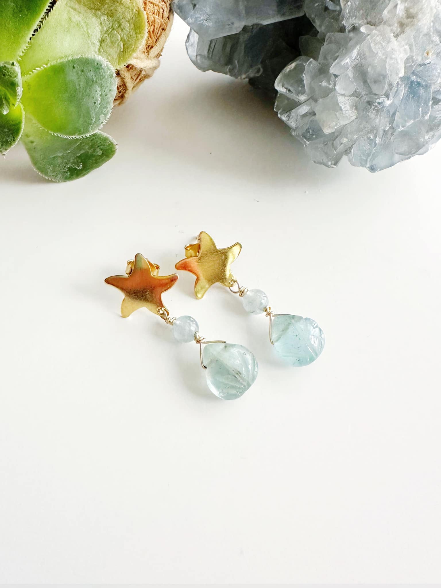 Aros estrella piedra Aguamarina. Incluye significado de la piedra  y packing para regalo