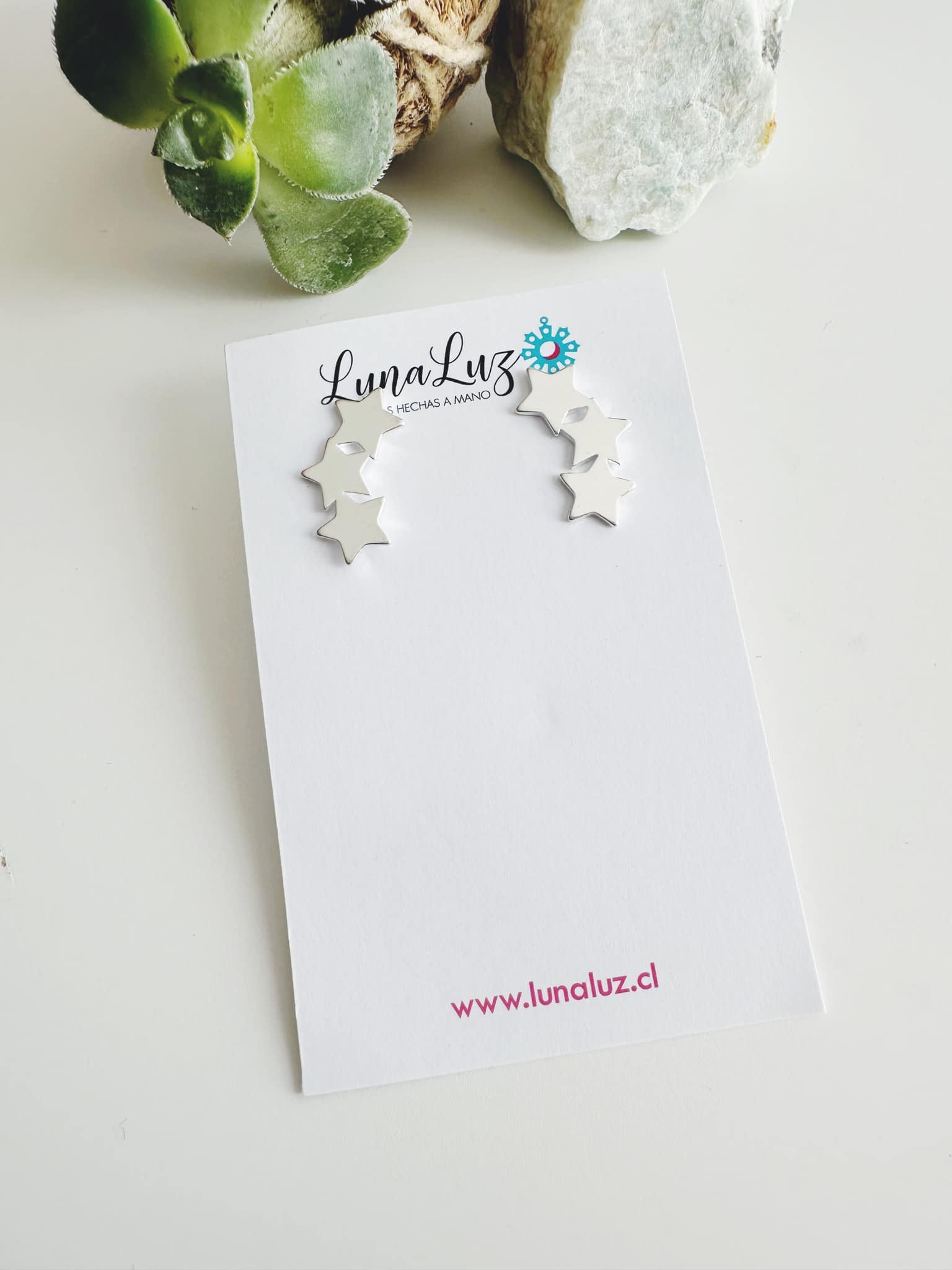 Aros cascada de estrellas plata. Incluye packing para regalo
