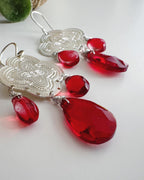 Aros silver y cristales rojos. Incluye packing para regalo