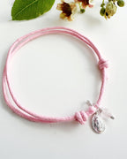 Pulsera silver Virgen de los milagros cordón ajustable. Incluye envoltorio de regalo