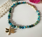 Pulsera Libélula, en piedras verdosas . Incluye packing para regalo