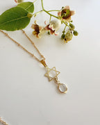 collar para mujer con la estrella de david y un punto de luz, bañado en oro